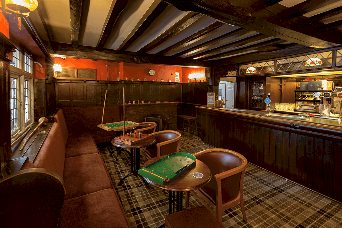 The cosy timber-beamed bar at The Fox Inn