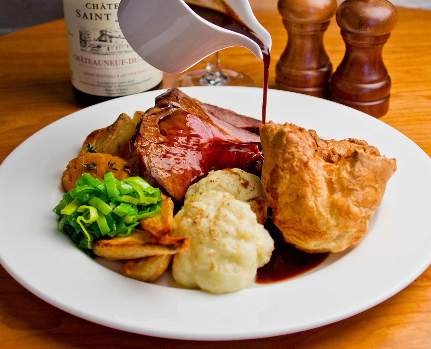A Sunday roast with Yorkshire pudding, vegetables and gravy at The Fox